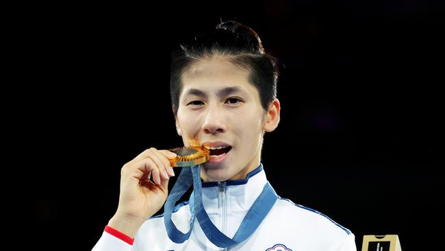 Gold Medallist Yu Ting-Lin shows off her new medal. Picture: Getty Images