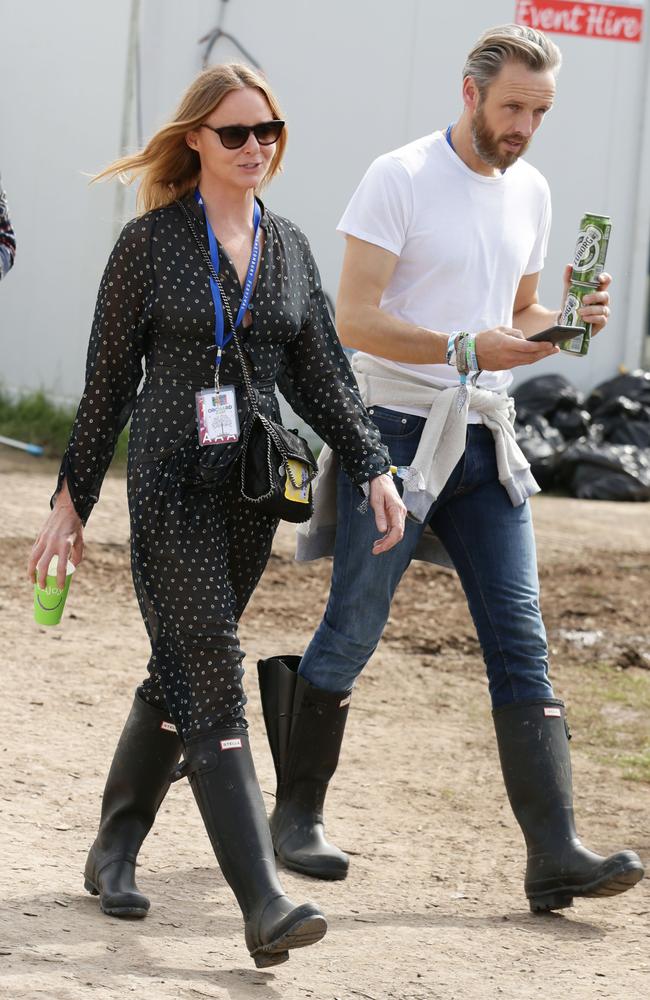 Stella McCartney with her husband Alasdhair Willis backstage at The Pyramid Stage at the 2015 Glastonbury Festival. Picture: AAP