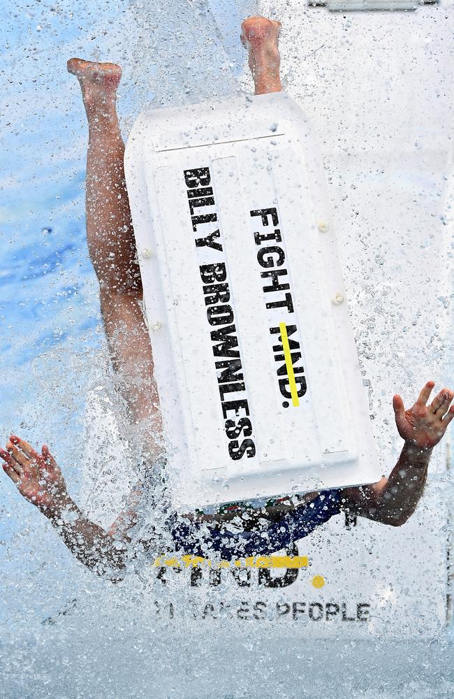 Billy Brownless goes tumbling into the water. Picture: Quinn Rooney/Getty Images