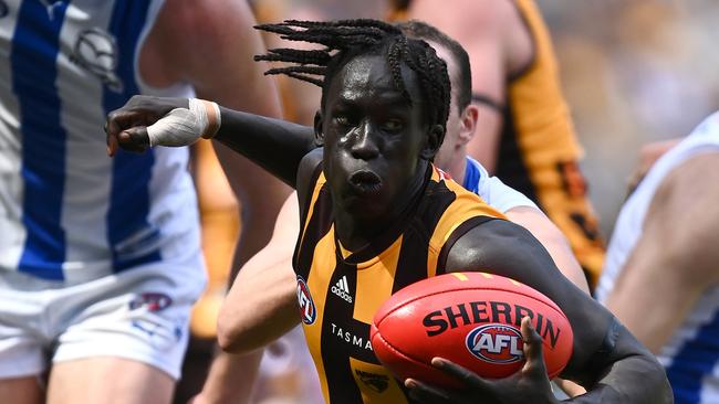 When Jiath started school he only knew a few English words, but footy was the conduit to making friends. Picture: Getty Images