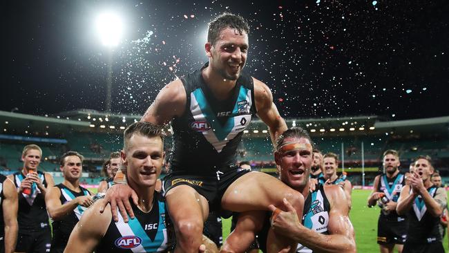 Port Adelaide's Travis Boak is chaired of the ground in his 200th game after the Power defeated the Swans at the SCG. Picture. Phil Hillyard