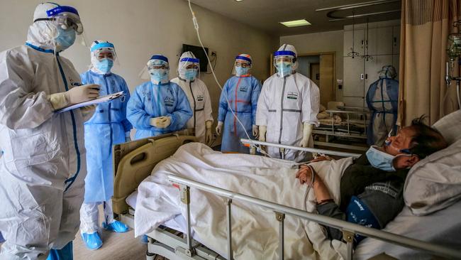 The Therapeutic Goods Administration is gearing up to fast track the approval of any vaccines or treatments to beat the coronavirus and warns against dodgy medicines. Picture: STR/AFP/CHINA OUT