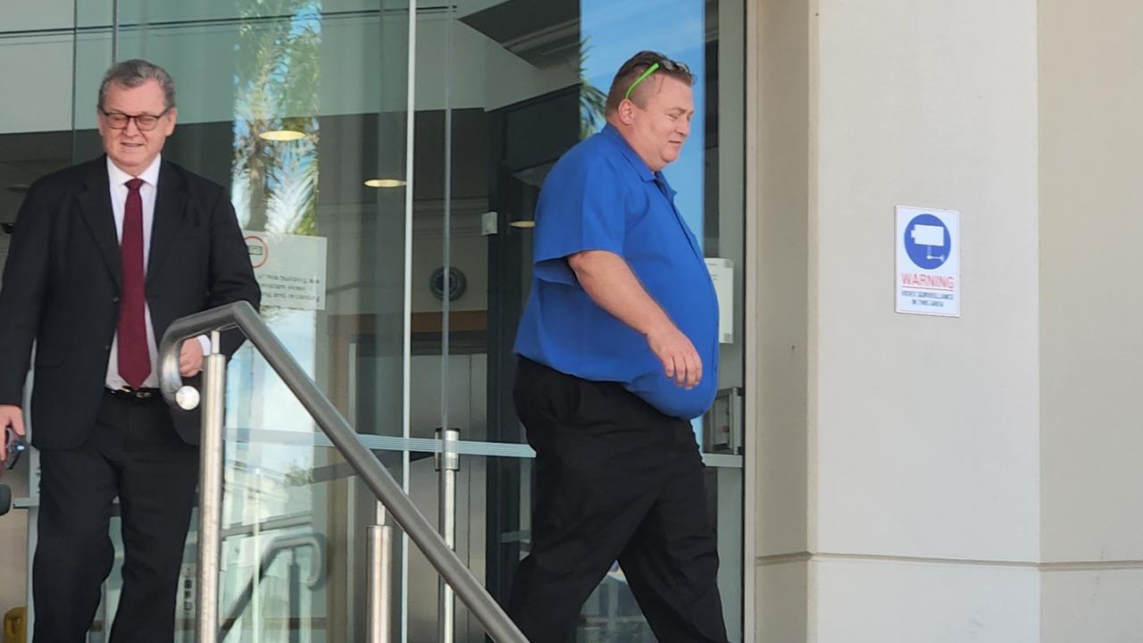 Craig Paul Carrington (right) at Rockhampton Courthouse with David Mills, part of his legal team.