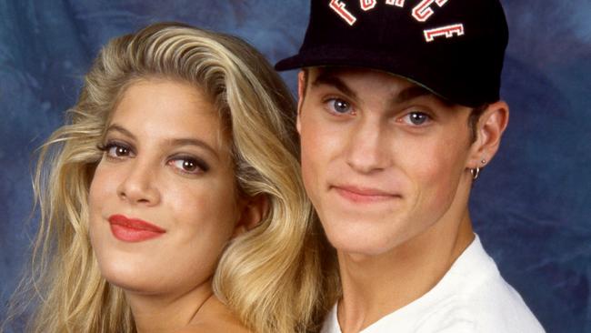 American actress and author Tori Spelling and American actor and producer Brian Austin Green, pose for a portrait circa 1992 in Los Angeles, California. Spelling and Green were co-stars on the television series Beverly Hills, 90210 as Donna Martin and David Silver, respectively. (Photo by Ron Davis/Getty Images)