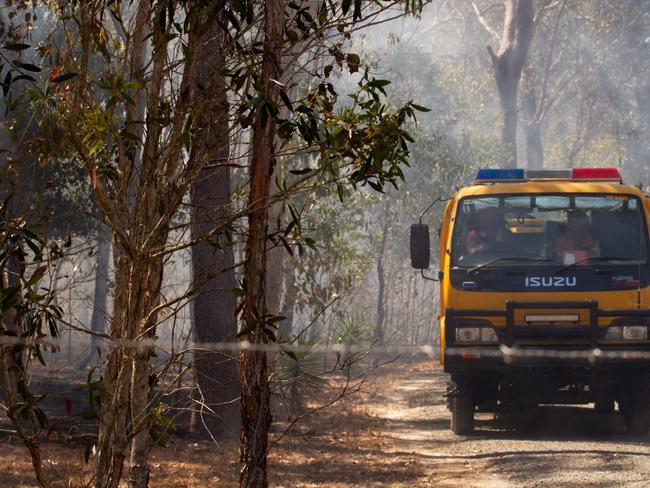 Emergency services respond to a bushfire at Moore Park Beach.