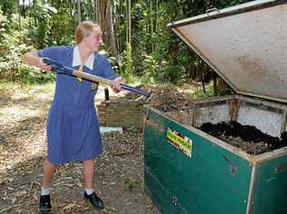 GREEN PASSION: Eco Club president Jessica Ling tends to their worm farm. Picture: Eden Boyd