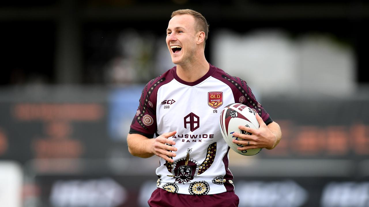 Daly Cherry-Evans has a laugh during a Queensland training session
