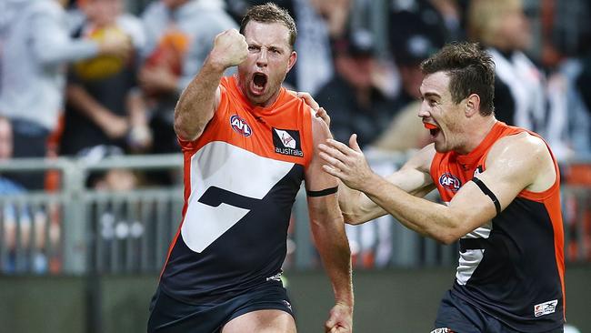 Steve Johnson celebrates kicking the match-winner. Picture: Getty