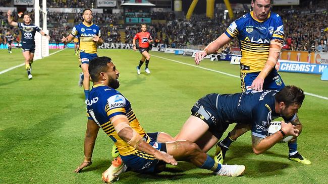 Kyle Feldt beats the Eels defence to score another try. Picture: Getty.