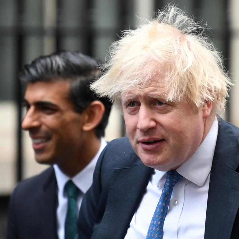 Mr Sunak and Boris Johnson, when he was PM (Photo by Daniel LEAL / AFP)