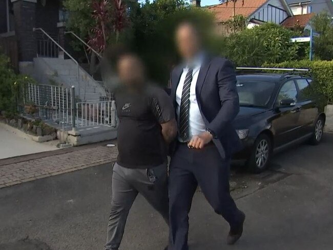 Dean Carr being arrested in Earlwood.