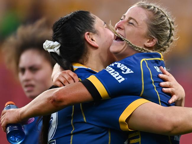 BRISBANE, AUSTRALIA - SEPTEMBER 25: Tayla Preston and Rima Butler celebrate victory during the NRLW Semi Final match between the Sydney Roosters and the Parramatta Eels at Suncorp Stadium on September 25, 2022 in Brisbane, Australia. (Photo by Albert Perez/Getty Images)