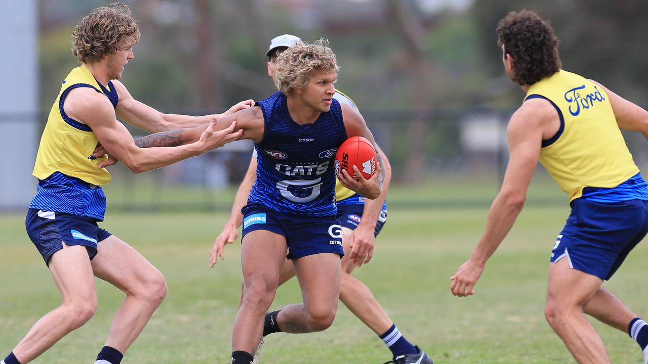 Quinton Narkle bursts clear at Cats training. Picture: Peter Ristevski