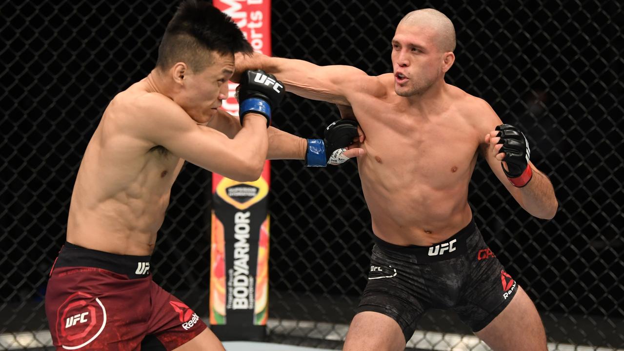 Brian Ortega punches Korean Zombie during their fight in October, 2020. Picture: Josh Hedges/Zuffa LLC via Getty Images