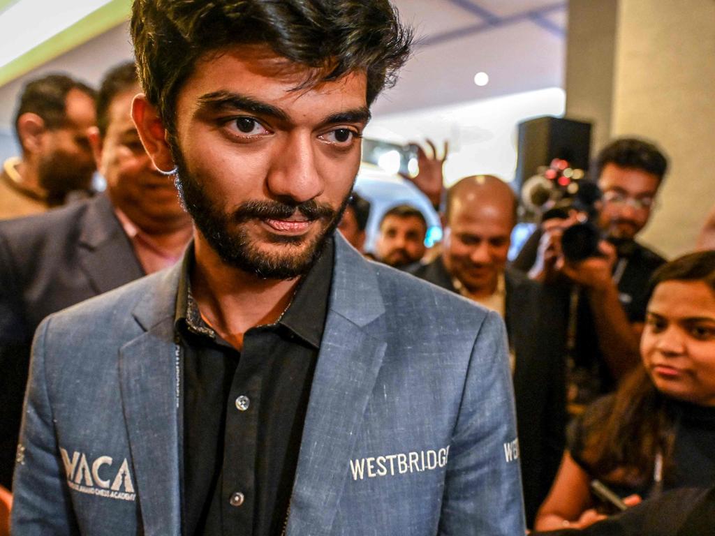 India's grandmaster Gukesh Dommaraju arrives for a press conference after winning against China's chess grandmaster Ding Liren in game 14 of the 2024 FIDE World Championship in Singapore. Picture: AFP