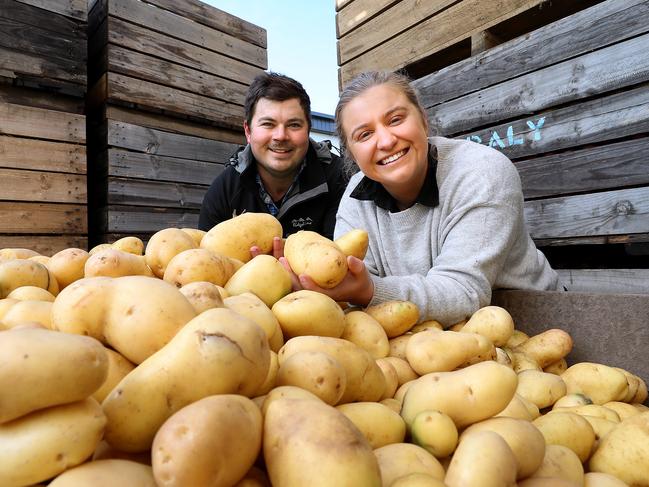 Daly Potato Co. farm manager Nathan Daly and marketing manager, Ruby Daly with some of the spuds they use in their hearty for their ready-to-eat mashed potato with gravy which was recognised with an award in the RAST fine food awards. Picture: SAM ROSEWARNE.