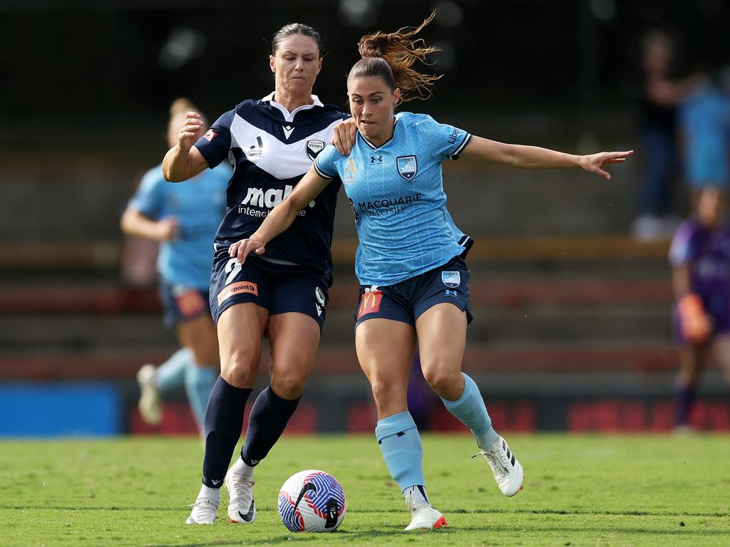 Sydney FC’s Margaux Chauvet is challenged by Melbourne Victory’s Emily Gielnik. Picture: Getty Images