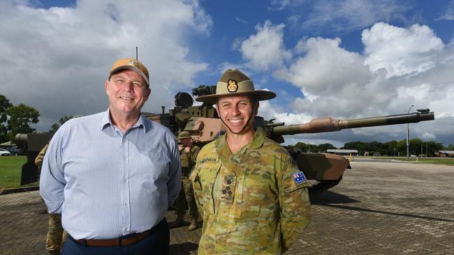 Northern Australia AIG head Dean Deighton and Commanding Officer 3rd Brigade Brigadier Ben McLennan with a new M1A2 Abrams SEPv3 main battle tank at Lavarack Barracks. Picture: Evan Morgan