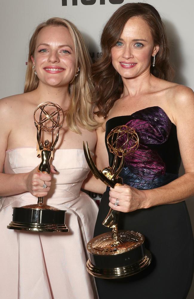 Elisabeth Moss and ‘The Handmaid’s Tale’ co-star Alexis Bledel attend Hulu’s 2017 Emmy After Party at Otium on September 17, 2017 in Los Angeles, California. Picture: Todd Williamson/Getty Images for Hulu