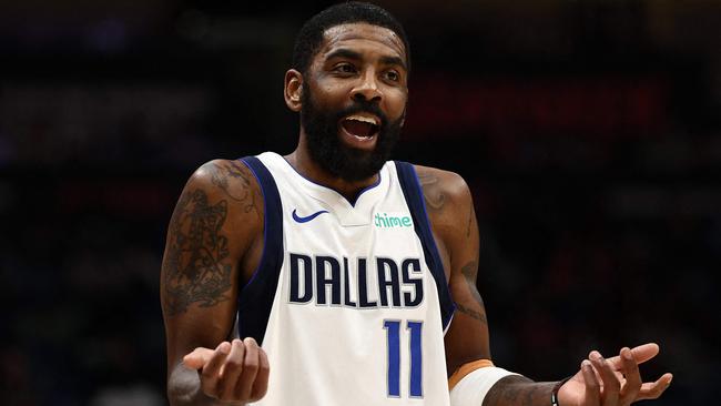 NEW ORLEANS, LOUISIANA - JANUARY 29: Kyrie Irving #11 of the Dallas Mavericks reacts during the game against the New Orleans Pelicans at Smoothie King Center on January 29, 2025 in New Orleans, Louisiana. NOTE TO USER: User expressly acknowledges and agrees that, by downloading and or using this photograph, User is consenting to the terms and conditions of the Getty Images License Agreement.   Chris Graythen/Getty Images/AFP (Photo by Chris Graythen / GETTY IMAGES NORTH AMERICA / Getty Images via AFP)