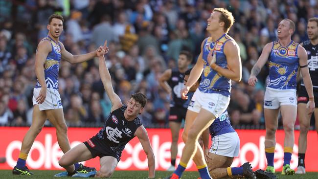 SYDNEY, AUSTRALIA – JUNE 06: Sam Walsh of the Blues celebrates kicking a goal during the round 12 AFL match between the Carlton Blues and the West Coast Eagles at Sydney Cricket Ground on June 06, 2021 in Sydney, Australia. (Photo by Mark Kolbe/Getty Images)