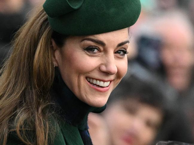 TOPSHOT - Britain's Catherine, Princess of Wales reacts after attending the Royal Family's traditional Christmas Day service at St Mary Magdalene Church in Sandringham, Norfolk, eastern England, on December 25, 2024. (Photo by Oli SCARFF / AFP)