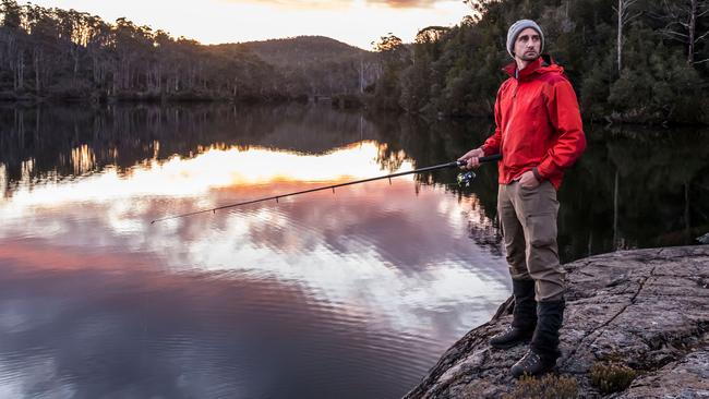 Walker and trout fisherman Richard Webb drops a line off Halls Island on Lake Malbena in the Walls of Jerusalem National Park and Tasmania’s World Heritage Area. Picture: CHRIS CRERAR