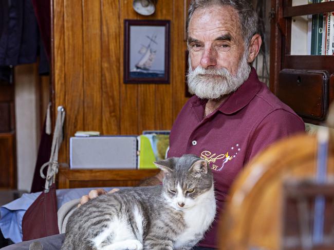 SYDNEY, AUSTRALIA, NOVEMBER 22, 2023. Sylph VI skipper and owner Robert âBobâ Williams with his cat Oli who will sail with Bob in the Sydney to Hobart yacht race on board Sylph VI. Photographer: Adam Yip