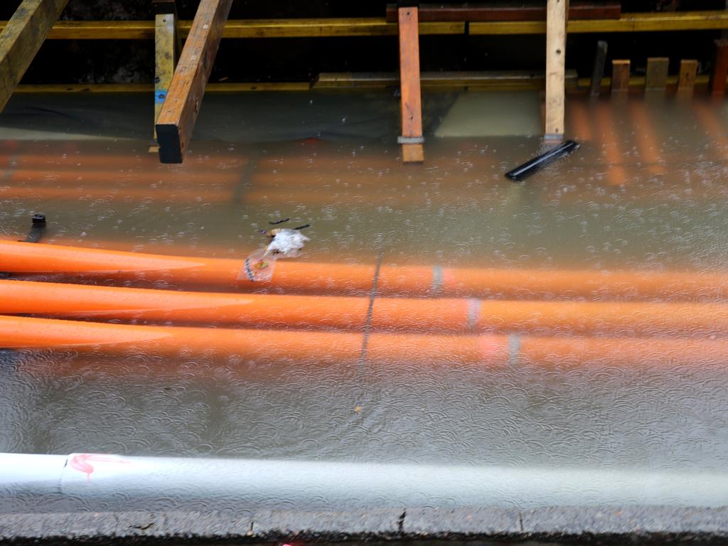 The light rail is now under water at Town Hall on George Street. Picture: John Grainger